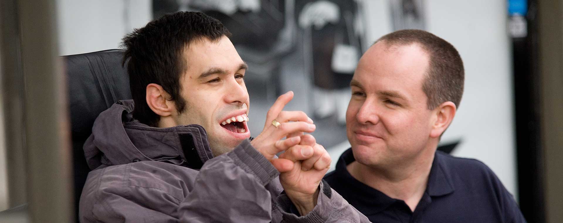 Man looking after someone with learning disability